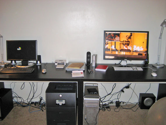Desk with lots of computers